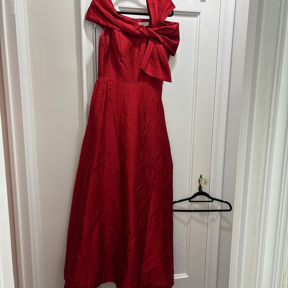 Red Rickie Freeman for Terri Jon red bow ball gown from 2024
